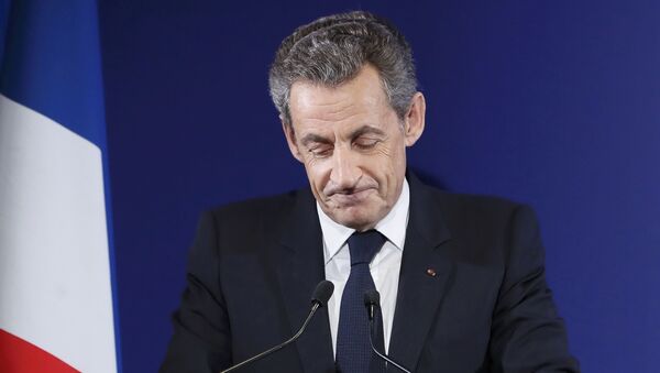 Nicolas Sarkozy, former French president and candidate for the French conservative presidential primary, reacts after the results in the first round of the French center-right presidential primary election at his headquarters in Paris, France - Sputnik Mundo