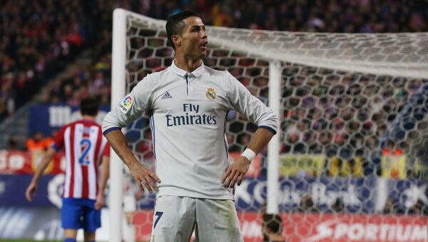 Cristiano Ronaldo comemora su gol, durante partido contra Atletico de Madrid - Sputnik Mundo