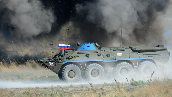 Un carro blindado del Ejército de Rusia - Sputnik Mundo