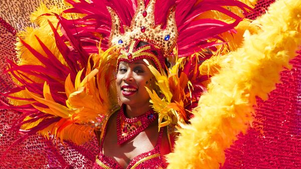 Participante del carnaval en Río de Janeiro - Sputnik Mundo