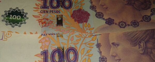 Pesos argentinos (imagen referencial) Pesos argentinos (imagen referencial) - Sputnik Mundo