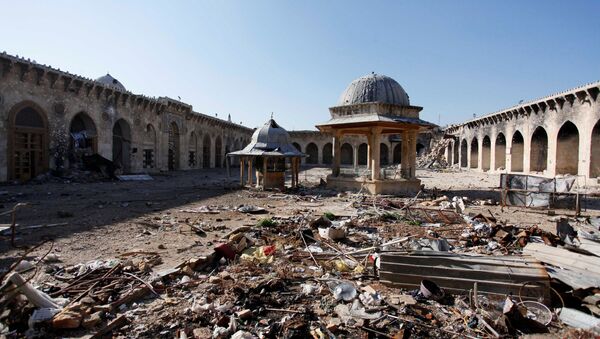 A general view of damage in the Umayyad mosque of Old Aleppo - Sputnik Mundo