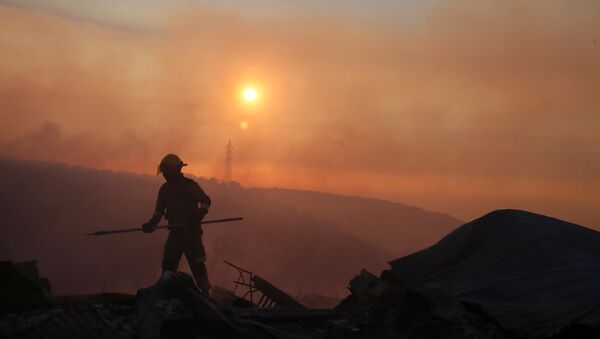 Un bombero chileno (imagen ilustrativa) - Sputnik Mundo