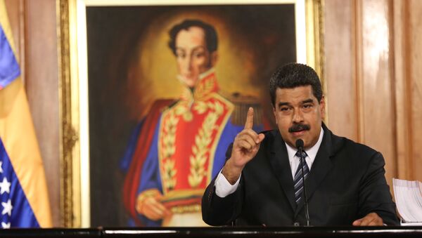 El presidente de Venezuela, Nicolás Maduro, habla durante una reunión con empresarios en Caracas - Sputnik Mundo