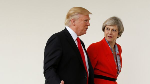 El presidente de EEUU, Donald Trump, y la primera ministra de Reino Unido, Theresa May (archivo) - Sputnik Mundo