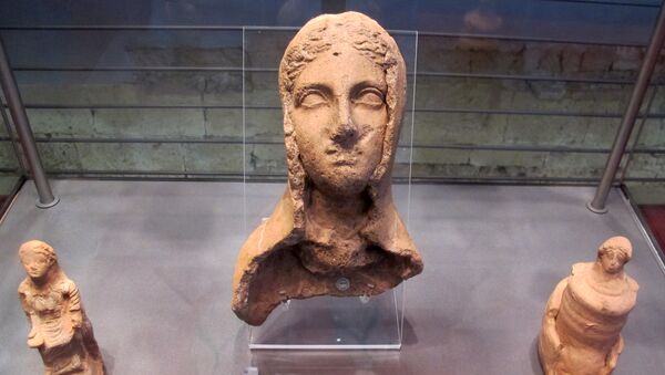 Una escultura de una mujer etrusca - Sputnik Mundo
