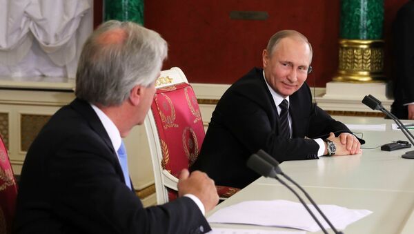 El presidente de Rusia, Vladímir Putin con su homólogo de Uruguay, Tabaré Vázquez - Sputnik Mundo