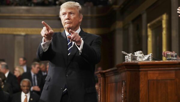 U.S. President Donald Trump reacts after delivering his first address to a joint session of Congress from the floor of the House of Representatives iin Washington, U.S., February 28, 2017 - Sputnik Mundo