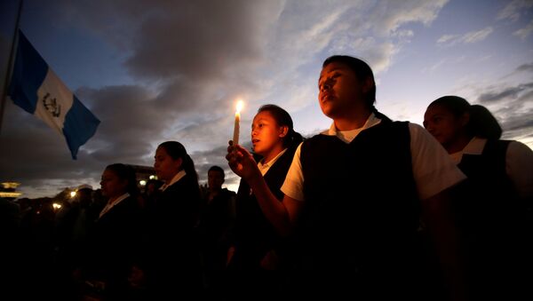 Homenaje a las víctimas del incendio en Guatemala (archivo) - Sputnik Mundo
