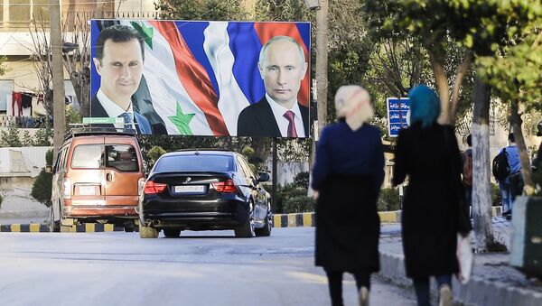Los retratos de Bashar Asad y Vladímir Putin en Alepo, foto de archivo - Sputnik Mundo
