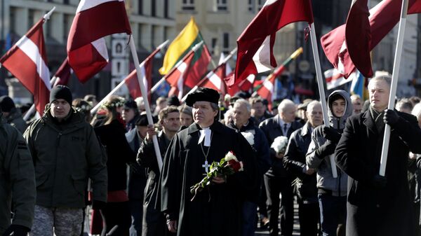 Una marcha que conmemora a las unidades letonas de las Waffen SS, archivo - Sputnik Mundo