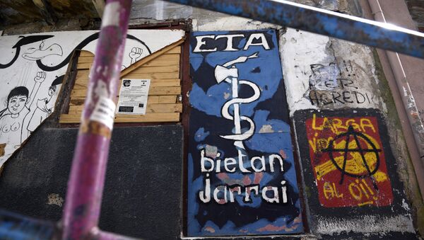 Picture shows a graffiti representing the logo of the armed Basque separatist group ETA in the northern Spanish Basque village of Bermeo - Sputnik Mundo