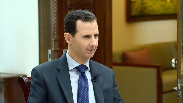 Bashar Asad, presidente sirio, durante la entrevista con la agencia Sputnik - Sputnik Mundo