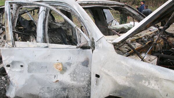 El coche de OSCE explotado en el este de Ucrania - Sputnik Mundo