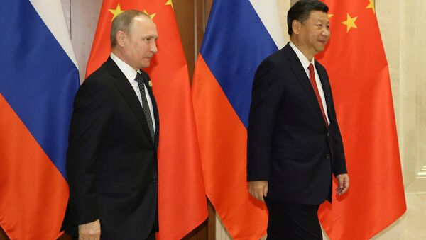 Presidente de Rusia, Vladímir Putin, y presidente de China, Xi Jinping - Sputnik Mundo