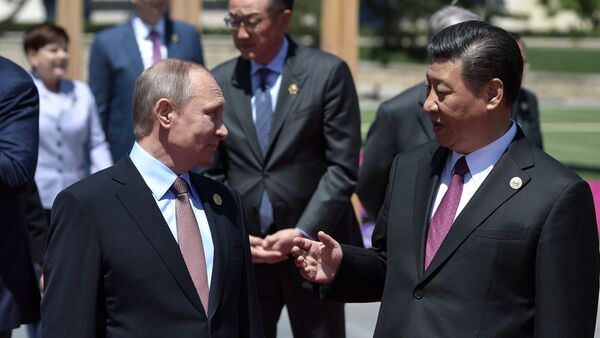 Presidente ruso, Vladímir Putin y presidente chino Xi Jiping - Sputnik Mundo