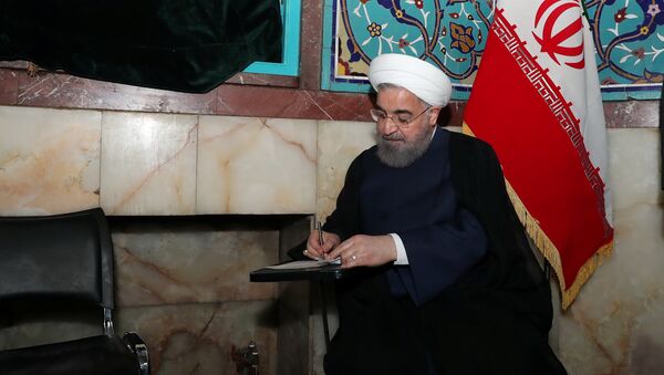 Hasán Rohani, presidente de Irán, durante las elecciones - Sputnik Mundo