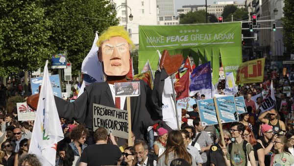 Protestas contra Donald Trump en Bruselas - Sputnik Mundo