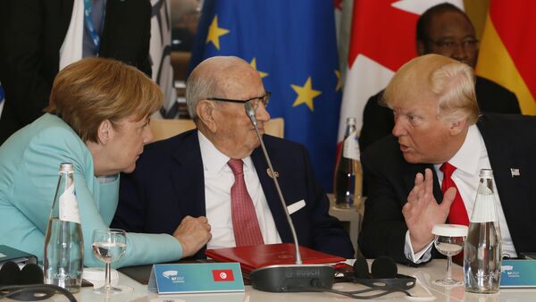 Donald Trump y Ángela Merkel - Sputnik Mundo