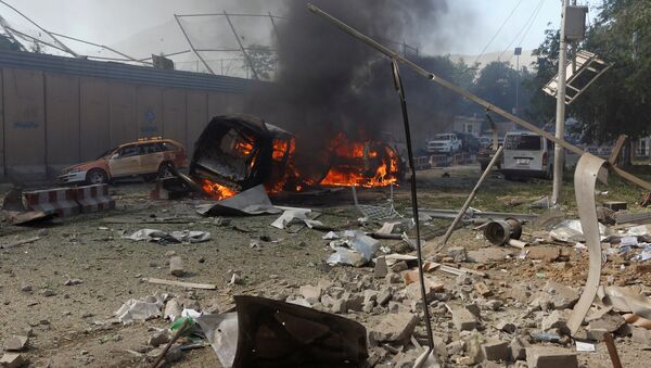 Consecuencias de un atentado de coche bomba en Afganistán (archivo) - Sputnik Mundo
