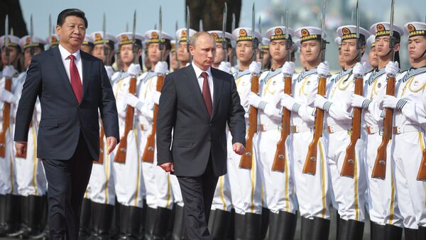 El presidente ruso Vladímir Putin y el presidente de China Xi Jinping - Sputnik Mundo