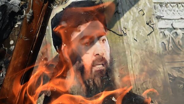 Foto de Abu Bakr Bagdadi en llamas - Sputnik Mundo