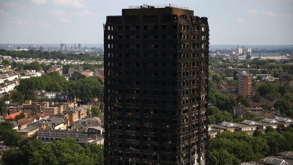 La torre Grenfell, en Londres, después del incendio - Sputnik Mundo