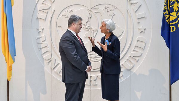 Presidente de Ucrania, Petró Poroshenko, y directora gerente del Fondo Monetario Internacional (FMI), Christine Lagarde - Sputnik Mundo