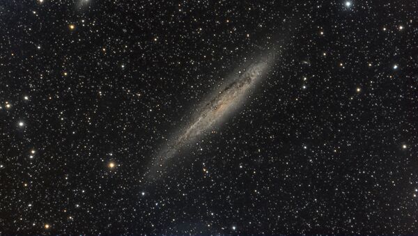 La galaxia NGC 4945 - Sputnik Mundo