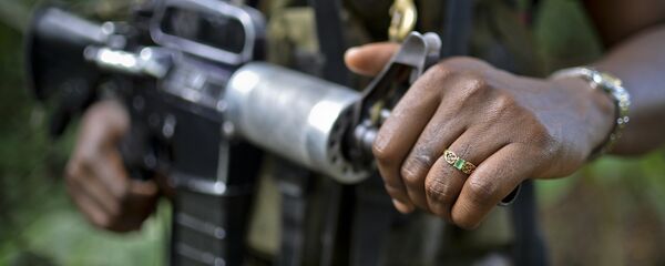 Un combatiente de ELN, Colombia (archivo) Un combatiente de ELN, Colombia (archivo) - Sputnik Mundo