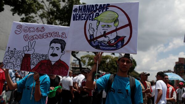 Los partidarios del presidente de venezuela, Nicolás Maduro - Sputnik Mundo
