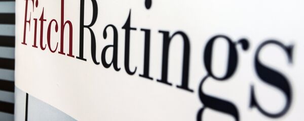 Logo de la agencia calificadora Fitch Ratings Logo de la agencia calificadora Fitch Ratings - Sputnik Mundo