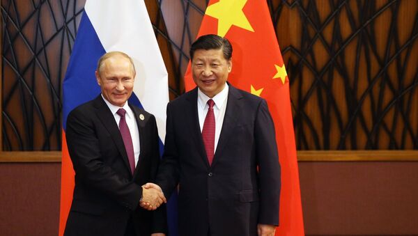 El presidente de Rusia, Vladímir Putin, y el presidente de China, Xi Jiping - Sputnik Mundo