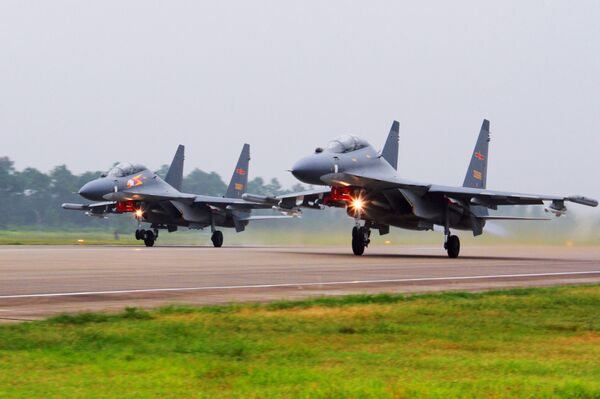 Cazas Su-30 de la Fuerza Aérea de China.  - Sputnik Mundo