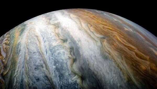 Planeta Júpiter captado por la sonda Juno (archivo) - Sputnik Mundo