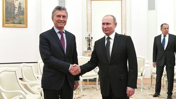 El argentino, Mauricio Macri, y el presidente ruso, Vladímir Putin - Sputnik Mundo