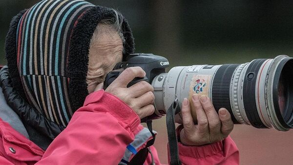 La veterana fotógrafa china Hong Nanli - Sputnik Mundo