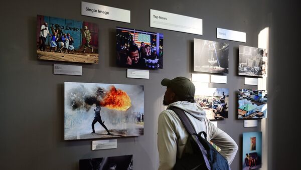 La exhibición de las fotos ganadoras del Concurso Andréi Stenin en Ciudad del Cabo, en Sudáfrica (archivo) - Sputnik Mundo