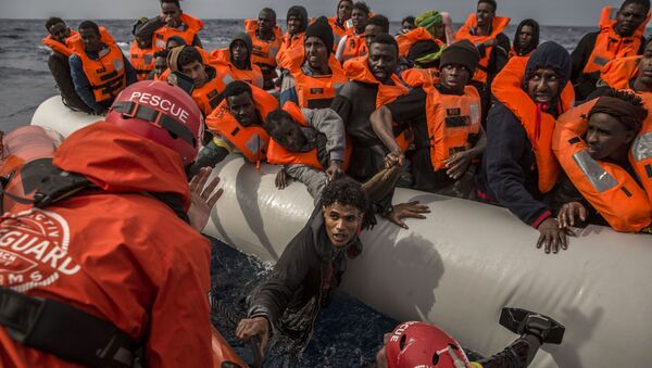 Migrantes de Libia - Sputnik Mundo