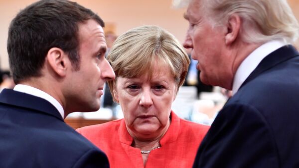 El presidente de Francia, Emmanuel Macron; la canciller alemana, Angela Merkel, y el presidente de EEUU, Donald Trump - Sputnik Mundo