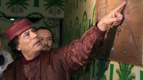 Muamar Gadafi, expresidente de Libia - Sputnik Mundo