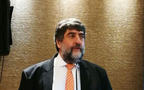 Ricardo Martínez,  gerente regional de SearchInform y jefe de la representación en Argentina, en la conferencia en Buenos Aires. - Sputnik Mundo