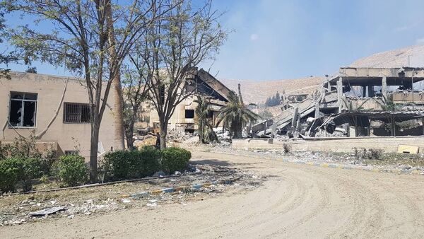 Las ruinas de un edificio en el municipio de Barzeh - Sputnik Mundo