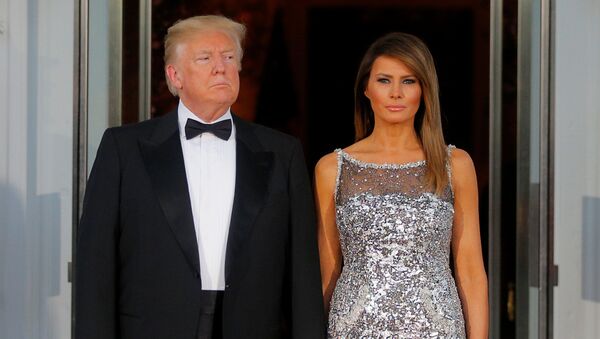 El presidente de EEUU, Donald Trump y su esposa, Melania - Sputnik Mundo