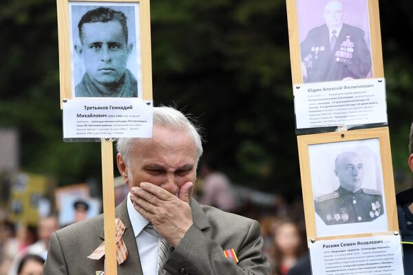 El Regimiento Inmortal reúne millones de personas alrededor del mundo El Regimiento Inmortal reúne millones de personas alrededor del mundo - Sputnik Mundo