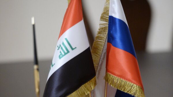 Banderas de Rusia e Irak - Sputnik Mundo