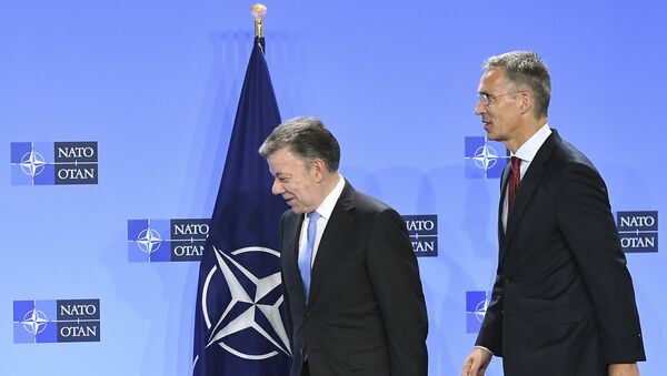Juan Manuel Santos, presidente de Colombia, y Jens Stoltenberg, secretario general de la OTAN - Sputnik Mundo