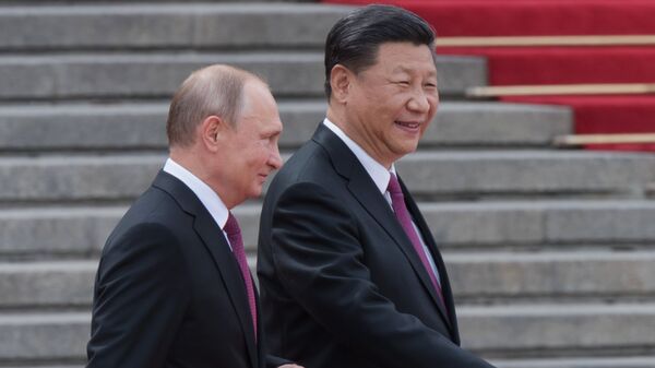 Presidente de China, Xi Jinping, y presidente de Rusia, Vladímir Putin - Sputnik Mundo