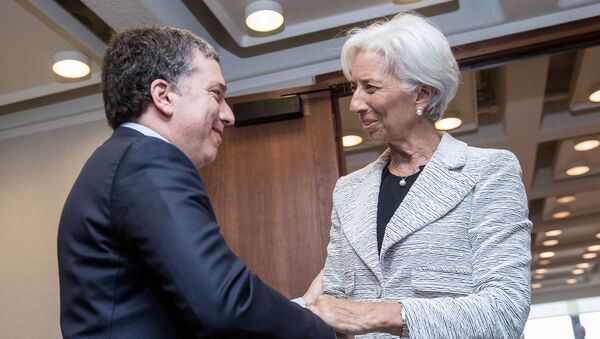 El ministro de Hacienda de Argentina, Nicolás Dujovne, y la directora del FMI, Christine Lagarde - Sputnik Mundo