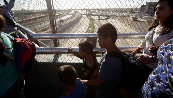 Migrantes en la frontera con EEUU - Sputnik Mundo